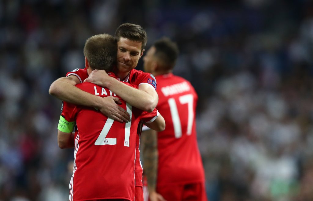 Bayern Munich's Xabi Alonso and Philipp Lahm at the end of the match.