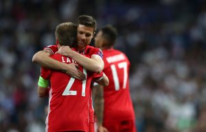 Bayern Munich's Xabi Alonso and Philipp Lahm at the end of the match.