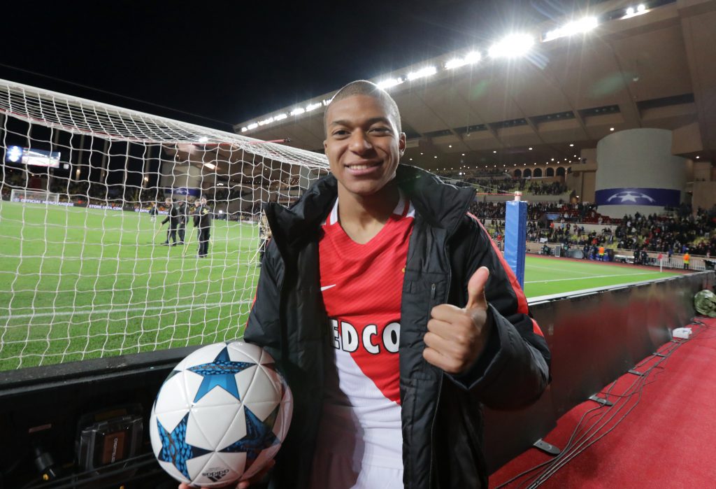 Monaco's Kylian Mbappe-Lottin celebrates after the match.