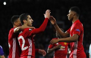 Manchester United's Henrikh Mkhitaryan celebrates scoring their first goal with Marcus Rashford.