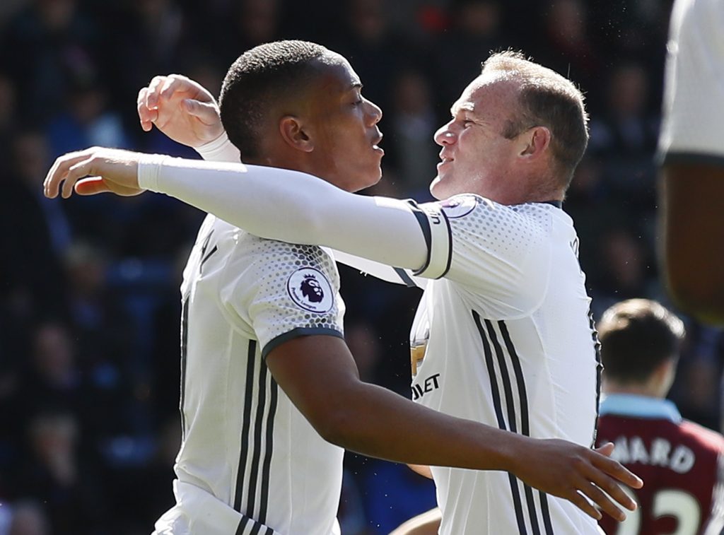 Manchester United's Anthony Martial celebrates with Wayne Rooney after scoring their first goal.