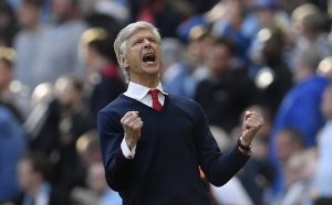 Arsenal manager Arsene Wenger celebrates after the match.