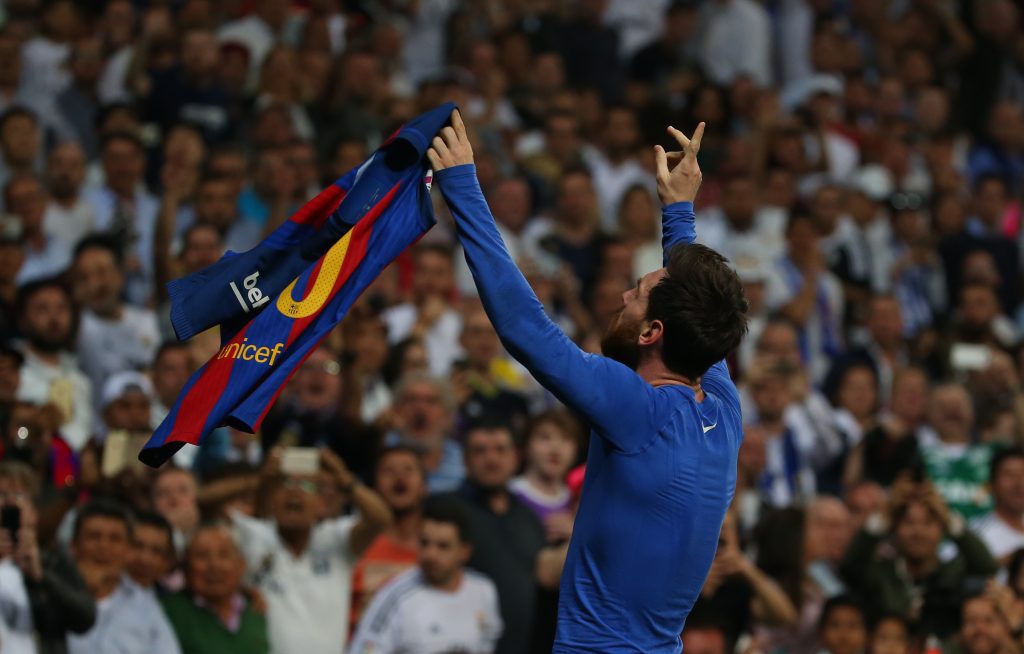 Barcelona's Lionel Messi celebrates scoring their third goal.