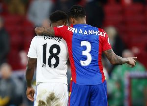 Sunderland's Jermain Defoe talks to Crystal Palace's Patrick van Aanholt.