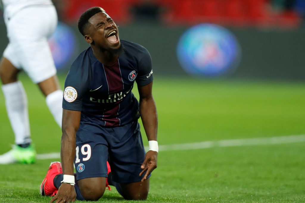 Paris St Germain's Serge Aurier reacts.