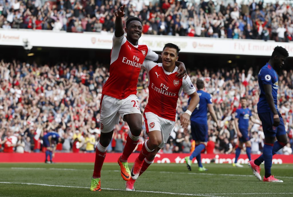Arsenal's Danny Welbeck celebrates scoring their second goal with Alexis Sanchez.