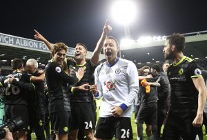Chelsea's John Terry celebrates with teammates after winning the Premier League title.