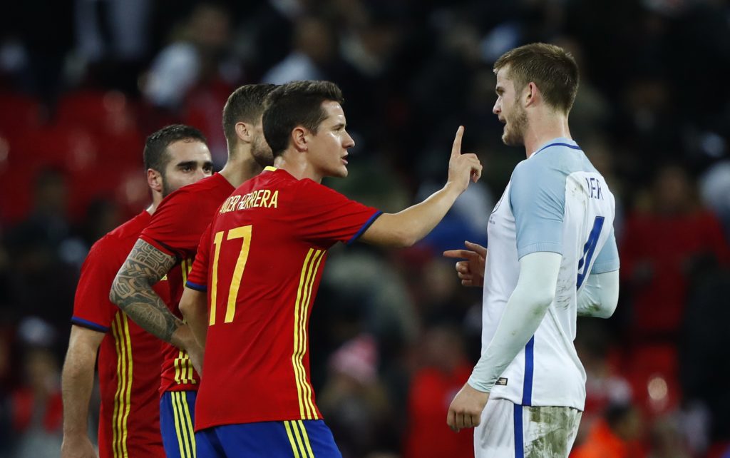 Spain's Ander Herrera clashes with England's Eric Dier after the match.