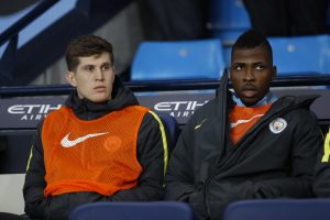 Manchester City's John Stones and Kelechi Iheanacho on the bench.