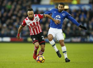 Southampton's Nathan Redmond in action with Everton's Aaron Lennon.