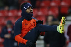 Tottenham's Danny Rose warms up before the match.