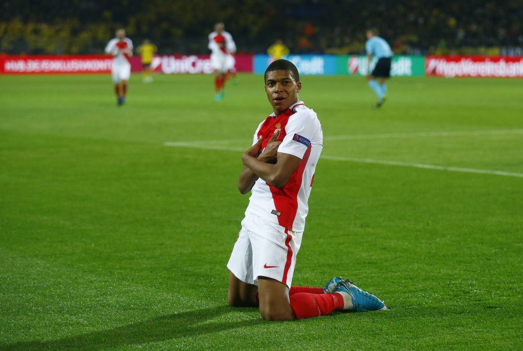 Monaco's Kylian Mbappe-Lottin celebrates scoring their third goal.