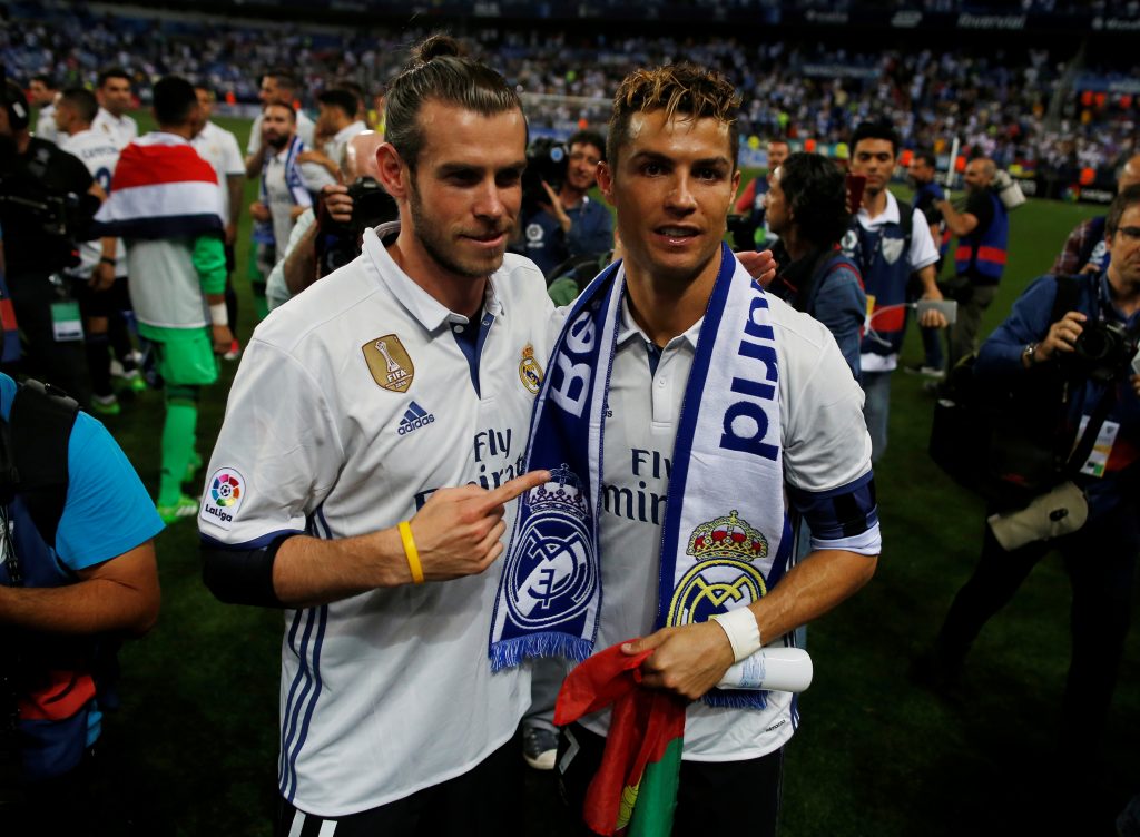Real Madrids Gareth Bale and Cristiano Ronaldo celebrate after winning La Liga.