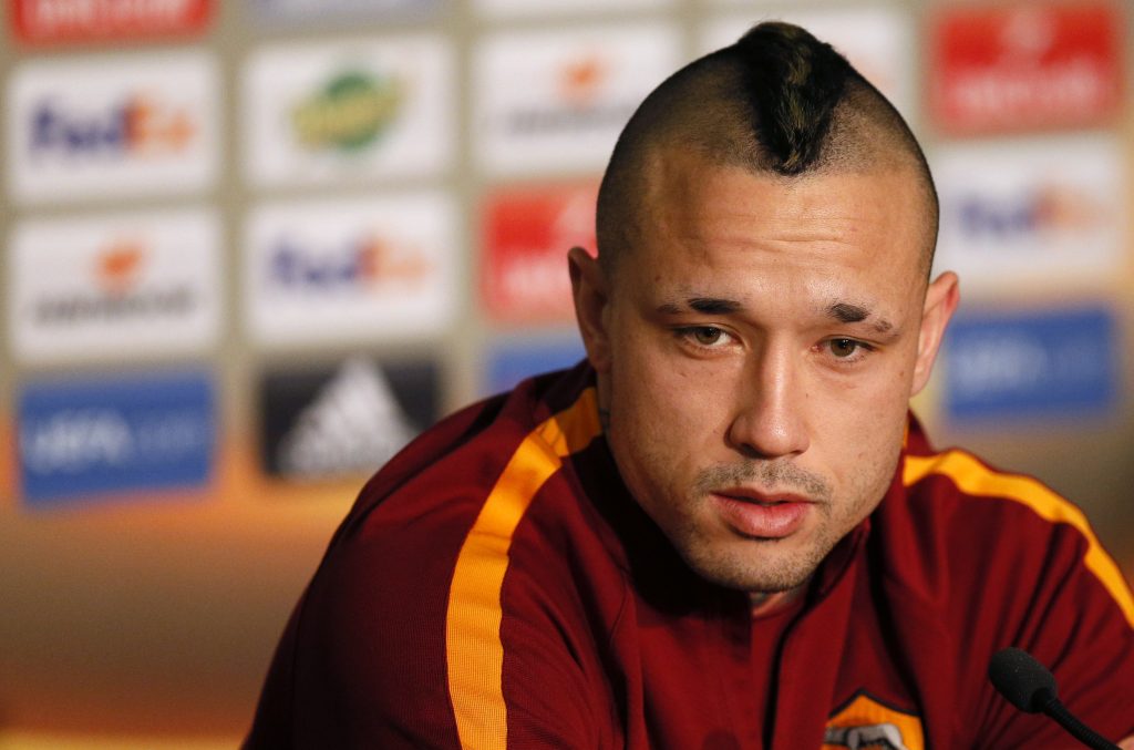 AS Roma's player Radja Nainggolan attends a news conference.