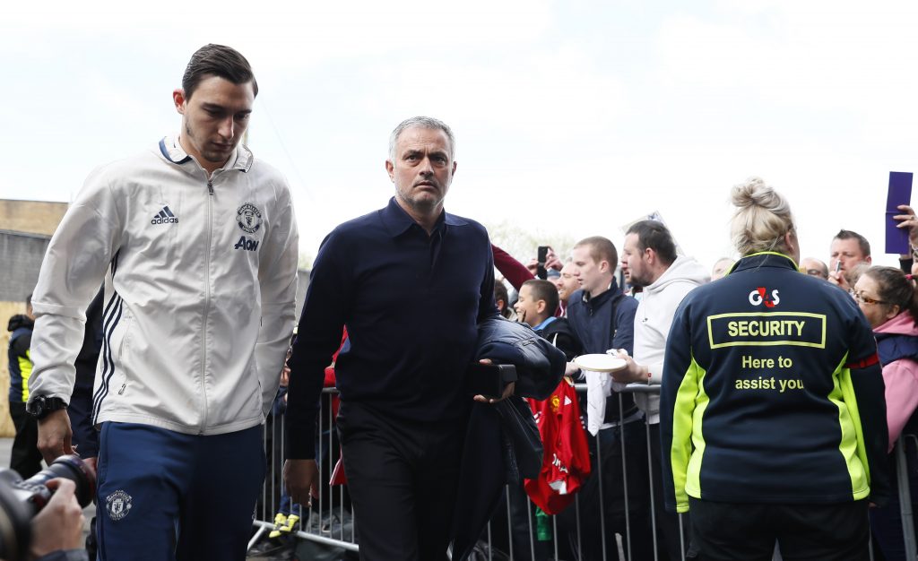 Jose Mourinho and Matteo Darmian arrive before the match.