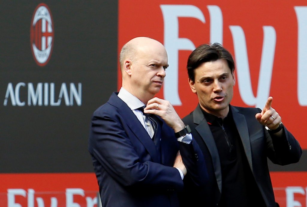 AC Milan's CEO Marco Fassone and coach Vincenzo Montella talk before the match.