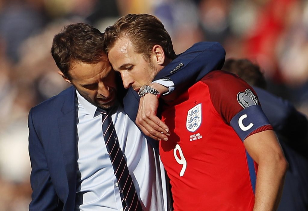 England manager Gareth Southgate speaks with Harry Kane after the game.