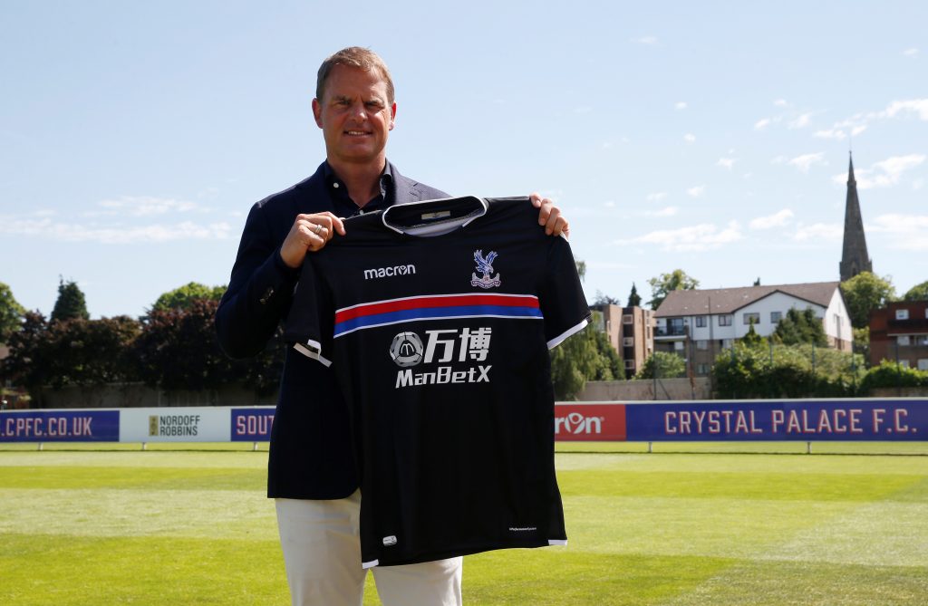 New Crystal Palace manager Frank de Boer poses with the club shirt.
