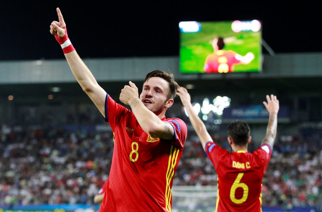 Spain's Saul Niguez celebrates after scoring a goal.