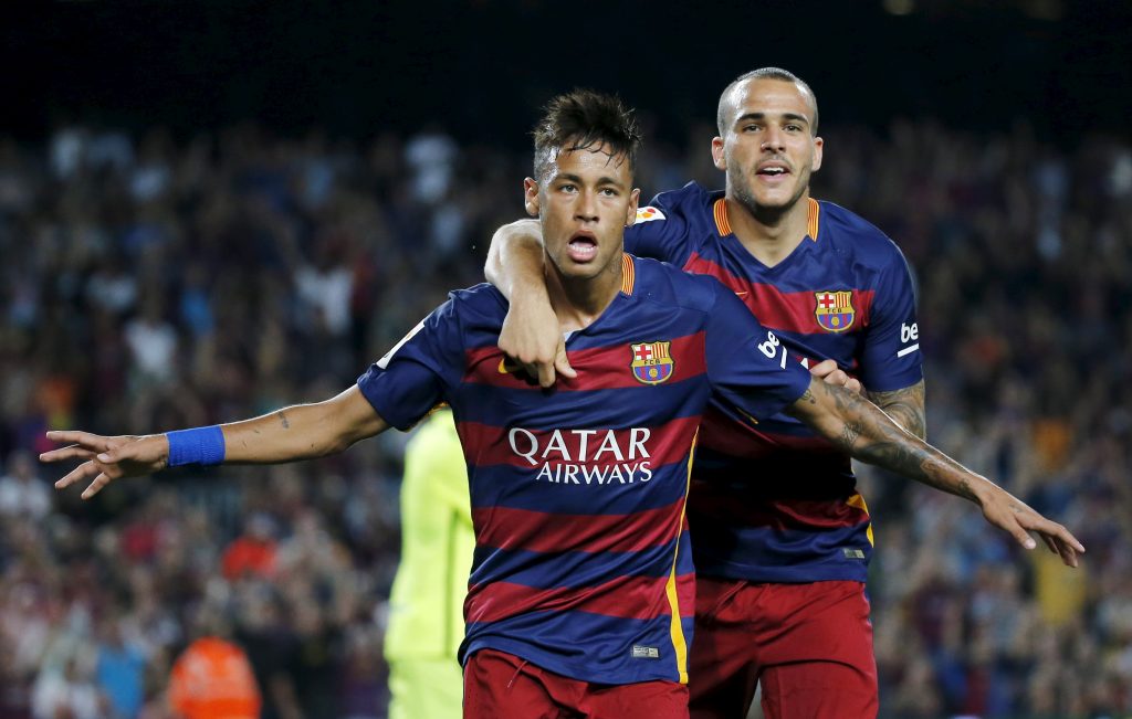 Barcelona's Neymar (L) and Sandro Ramirez celebrate goal.