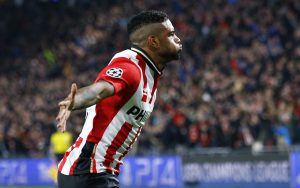 PSV Eindhoven's Jurgen Locadia celebrates his goal against Wolfsburg.