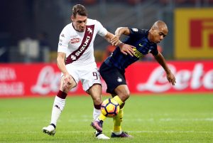 Inter Milan's Joao Mario (R) in action against Andrea Belotti of Torino.