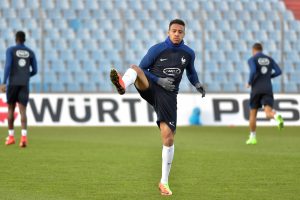 France's Corentin Tolisso attends a training session.