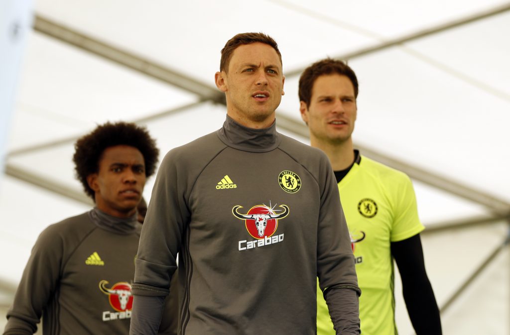Chelsea's Nemanja Matic, Willian and Asmir Begovic arrive for training.
