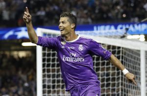 Real Madrid's Cristiano Ronaldo celebrates scoring their third goal.