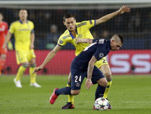 Marco Verratti (R) challenges Nemanja Matic (L).