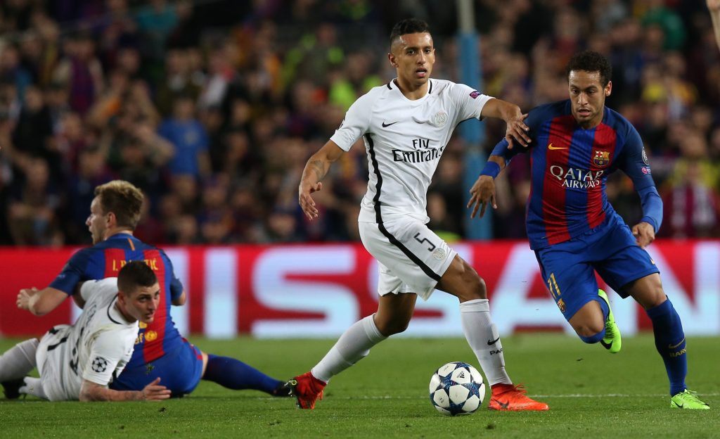 Barcelona's Neymar in action with Paris Saint-Germain's Marquinhos.