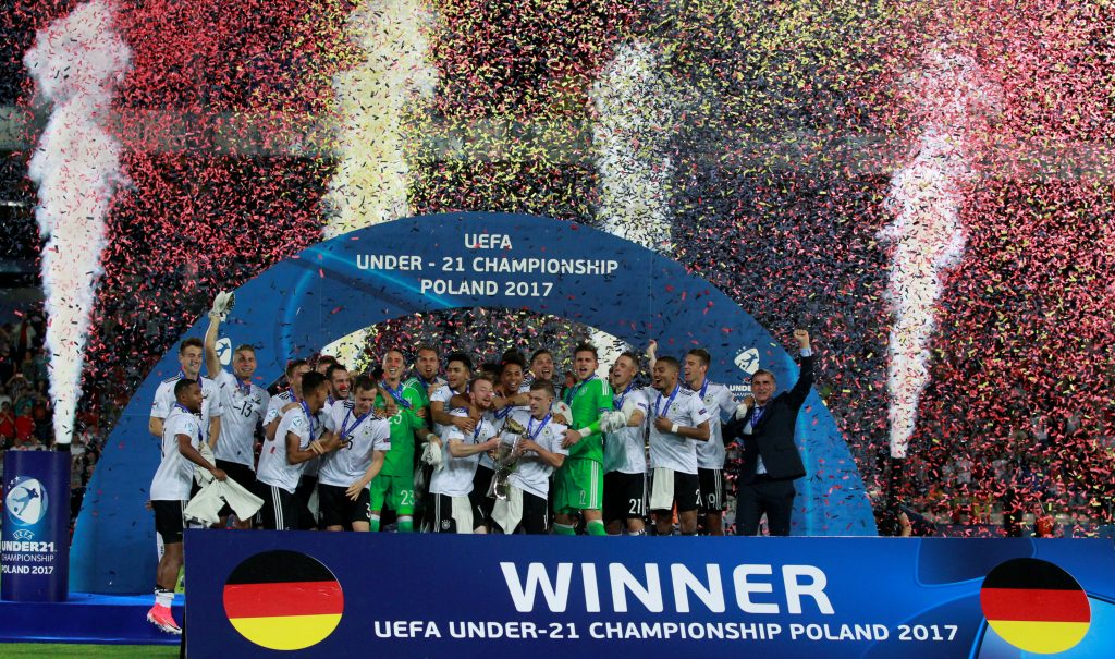 Germany's team members celebrate after winning the cup.