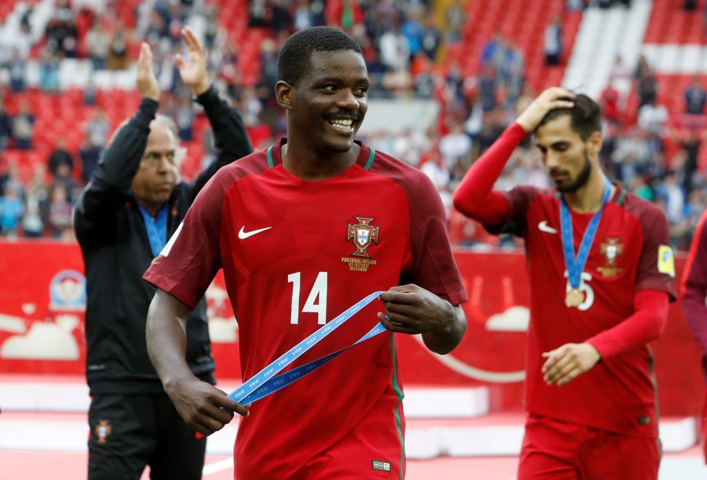 Portugals William Carvalho celebrates with his medal after the game.