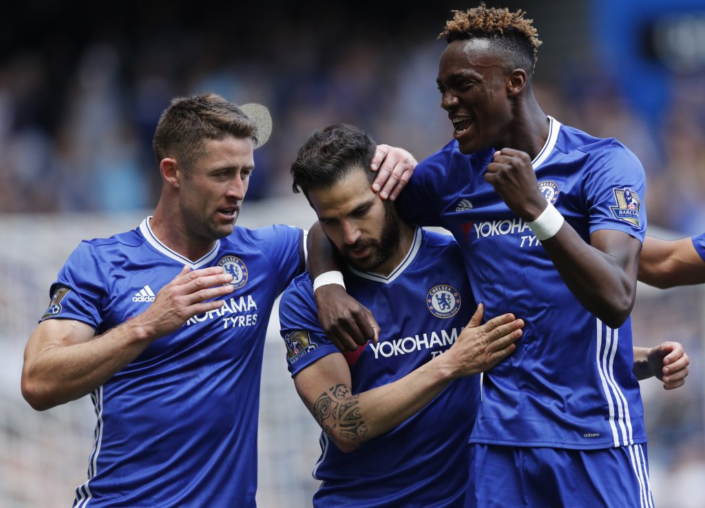 Chelsea's Cesc Fabregas celebrates scoring their first goal with Tammy Abraham and Gary Cahill.