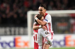 Ajax Amsterdam's Lasse Schone (L) and Abdelhak Nouri celebrate scoring.