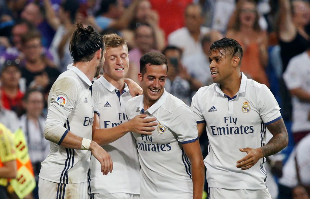 Real Madrid's Toni Kroos celebrates his goal with teammates Gareth Bale, Lucas Vazquez and Mariano Diaz.