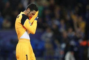Sevilla's Sergio Rico looks dejected.