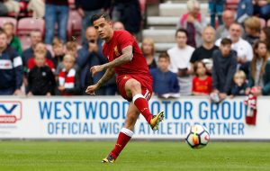 Liverpool's Philippe Coutinho warms up before the match.