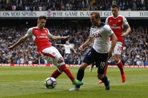Harry Kane is brought down by Gabriel Paulista for a penalty.