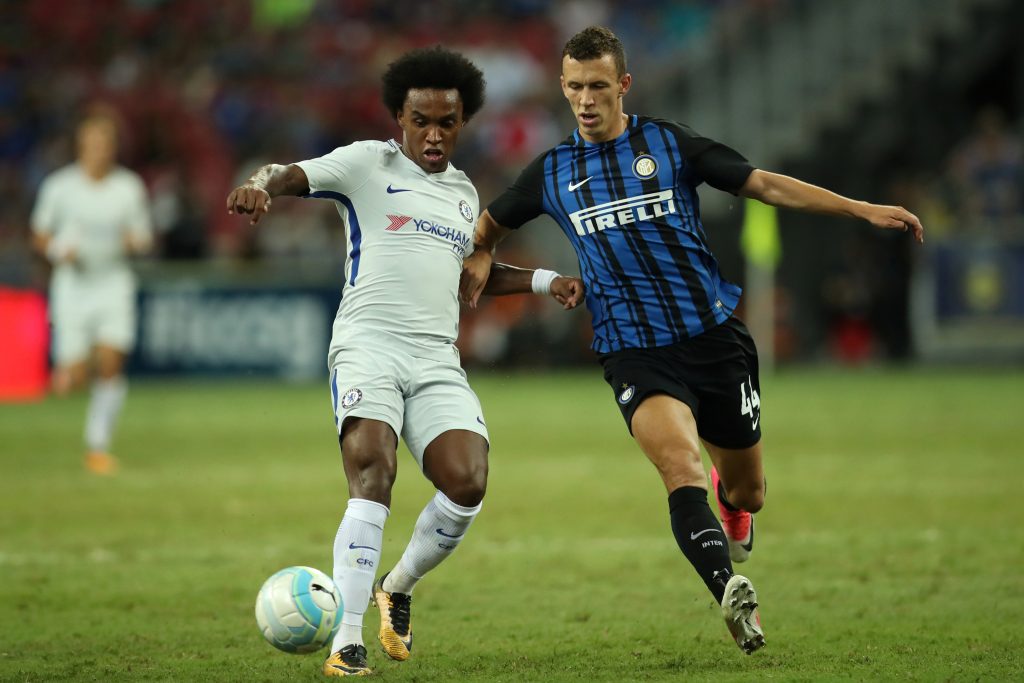 Chelsea's Willian in action with Inter Milan's Ivan Perisic.