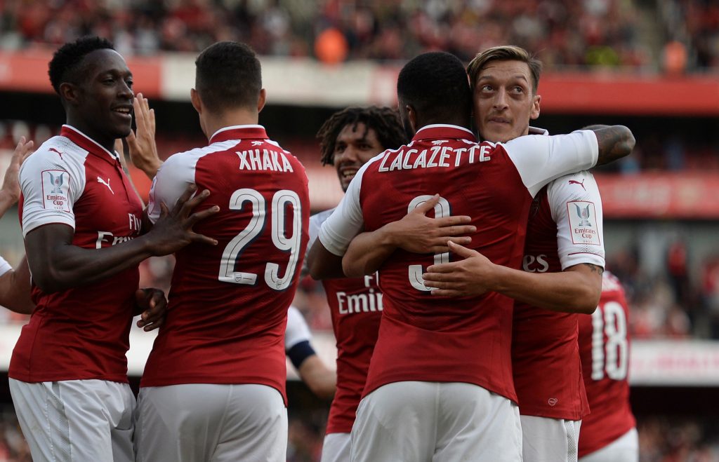 Arsenal's Alexandre Lacazette celebrates scoring their first goal with team mates.