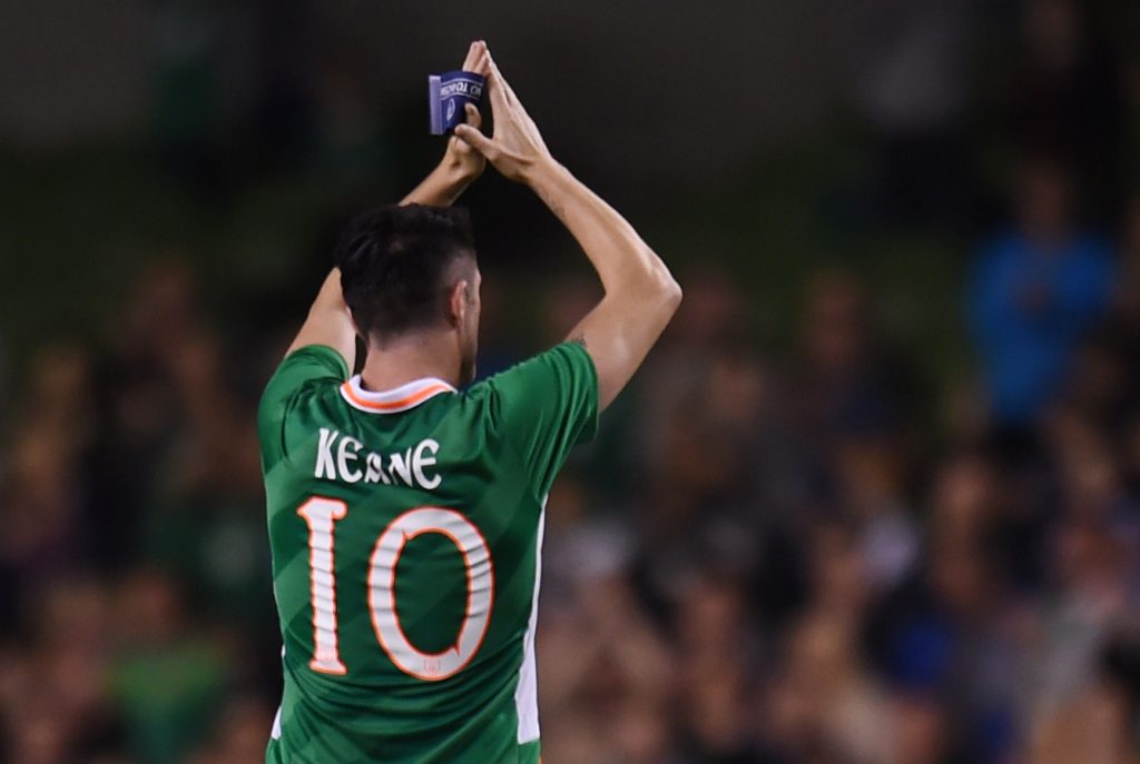 Republic of Ireland's Robbie Keane applauds fans as he walks off to be substituted.