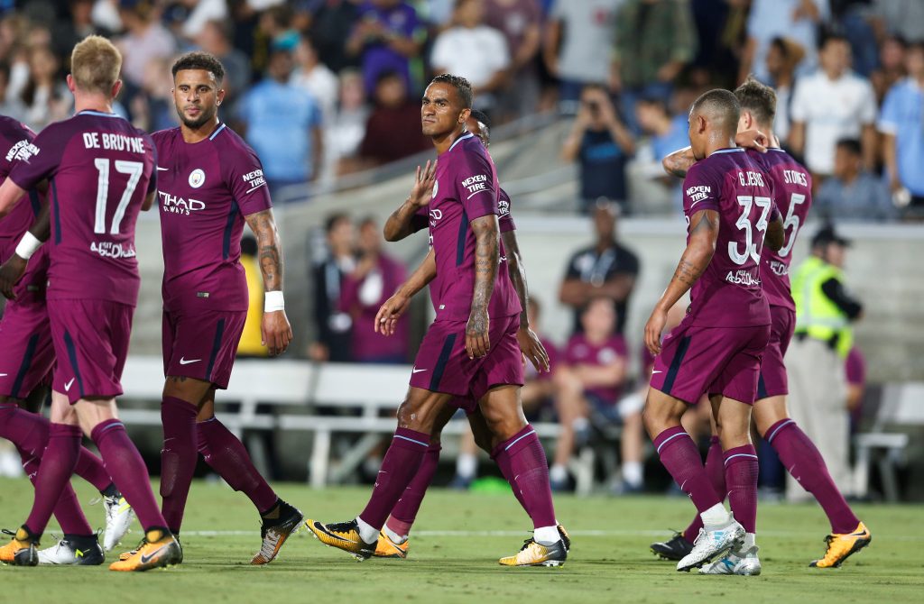 Manchester City's Danilo celebrates a goal with team mates.