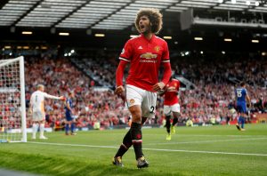 Manchester United's Marouane Fellaini celebrates scoring their second goal.