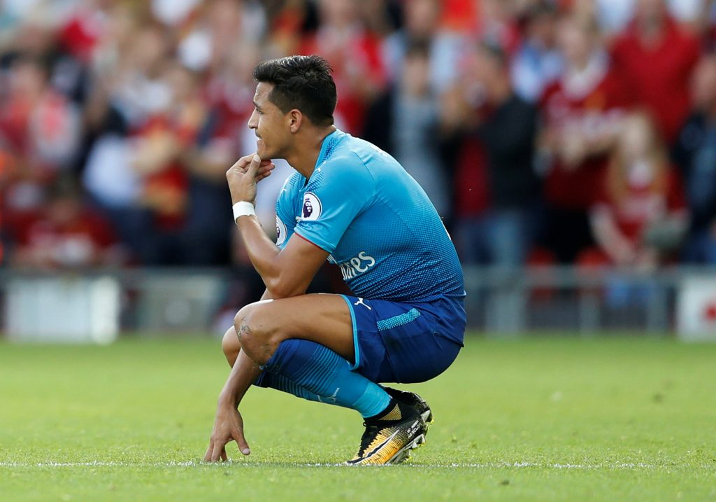 Arsenal's Alexis Sanchez looks dejected.