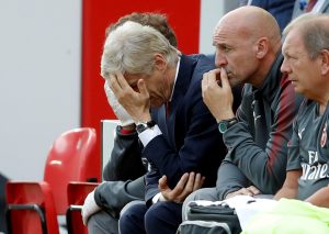 Arsenal manager Arsene Wenger looks dejected.