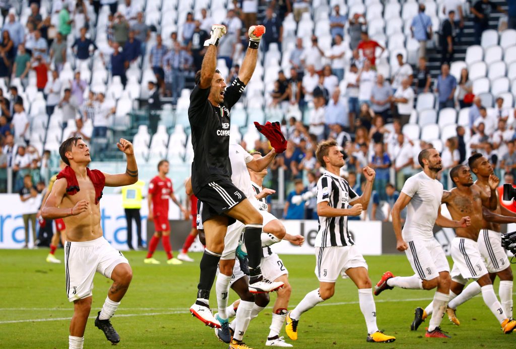 Juventus Gianluigi Buffon and teammates celebrate after the match.