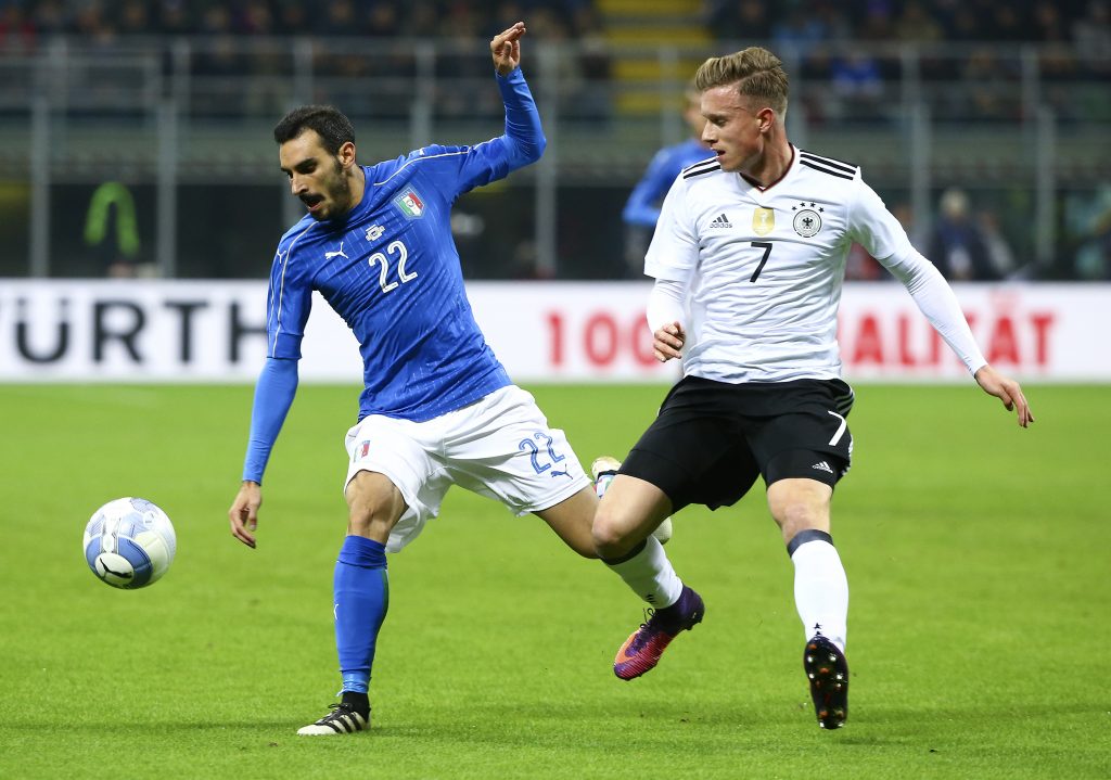 Italy's Davide Zappacosta in action against Germany's Yannick Gerhardt.