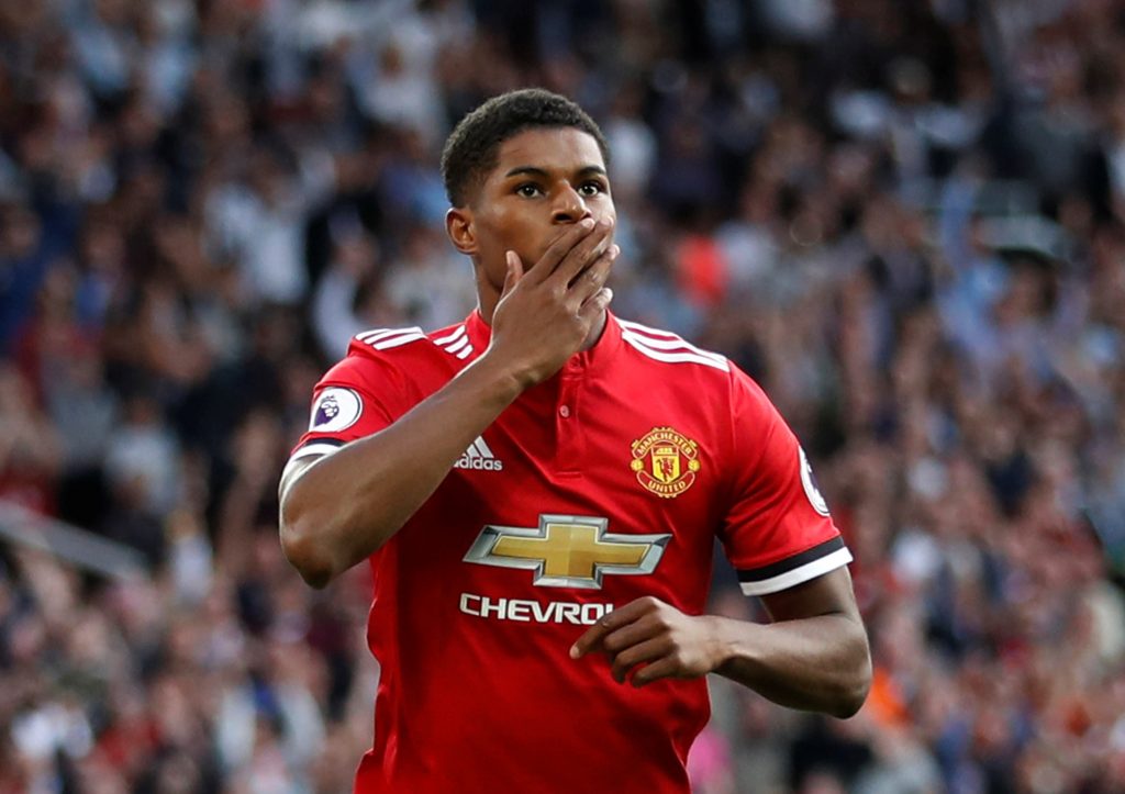 Manchester United's Marcus Rashford celebrates scoring their first goal.