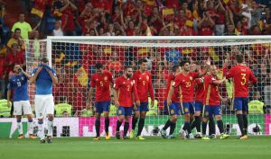 Spains Alvaro Morata celebrates scoring their third goal with team mates.